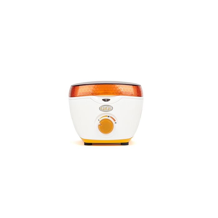 Front view of GiGi Mini Honee Wax Warmer featuring its orange lid, markings, LED indicator light, & temperature control knob 