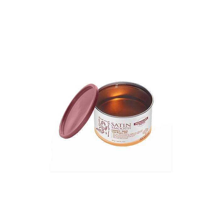 An open container of golden honey with a clipping path
