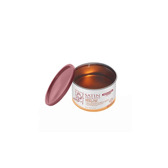 An open container of golden honey with a clipping path An open container of golden honey with a clipping path