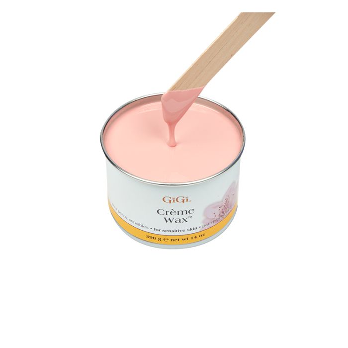Top view of GiGI Creme Wax, front label is visible, applicator with melted wax showing consistency.