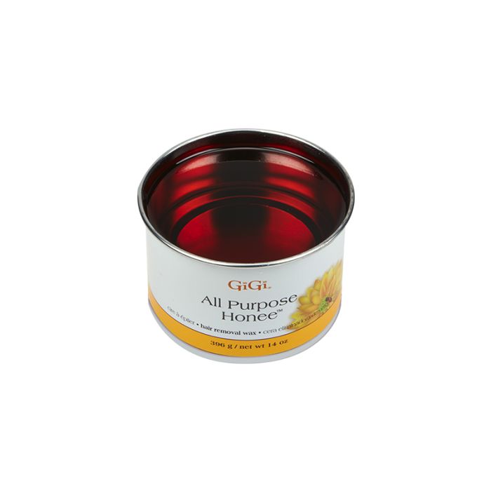 Top view of an open 14 ounce can of GiGi All Purpose Honee Soft showing its deep translucent brown color
