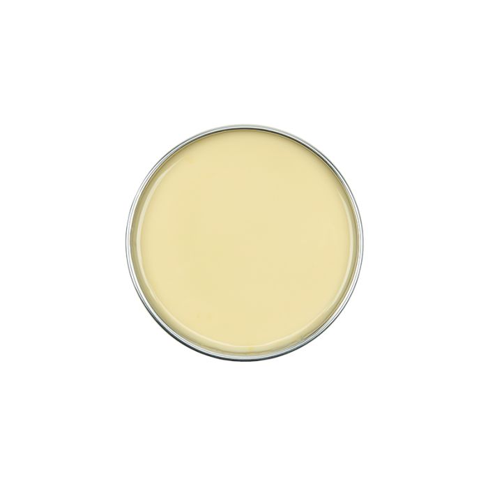 Top view of an open can of GiGi All Purpose Hard Wax showing its creamy white color 