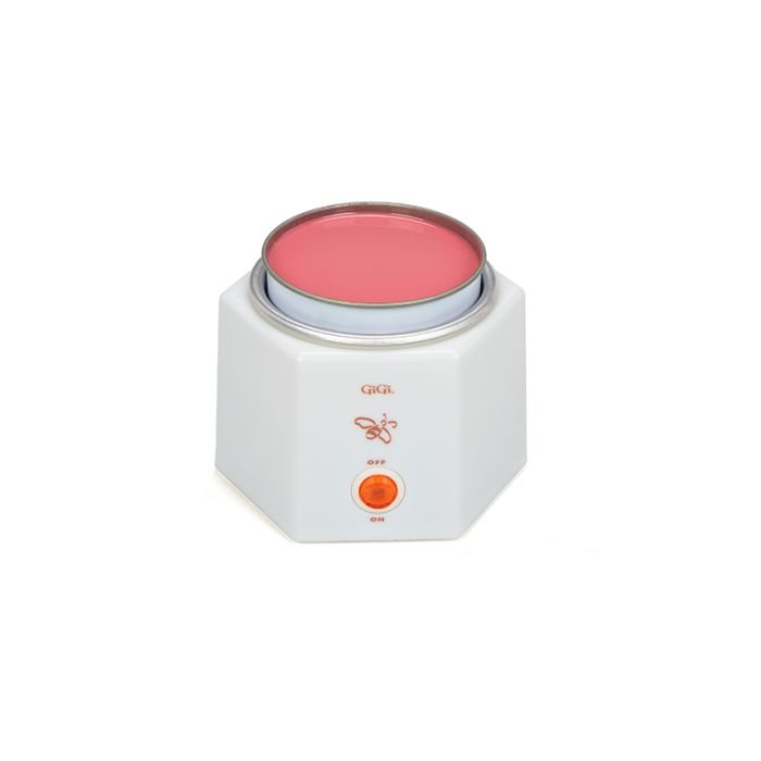 Angled front view of GiGi Space Saver Warmer with a can filled with melted rose pink wax 