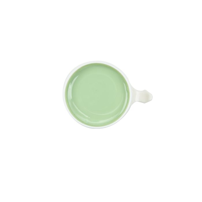 Top view of GiGi Brazilian Bikini Wax Microwave bottle uncapped showing its creamy pastel green wax contents Top view of GiGi Brazilian Bikini Wax Microwave bottle uncapped showing its creamy pastel green wax contents