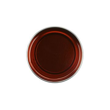 Top view of an open 14 ounce can of GiGi All Purpose Honee Soft showing its deep translucent brown color