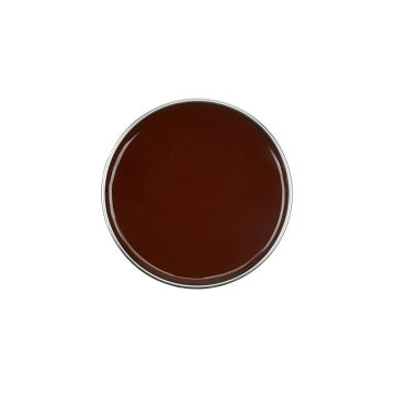 Top view of GiGi Brazilian Hard Body Wax without its lid showing its deep honey color