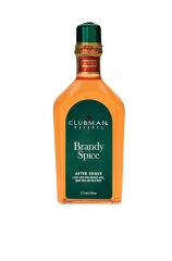 A 6 ounce bottle of Clubman Reserve Brandy Spice After Shave Lotion featuring its brandy-colored liquid contents
