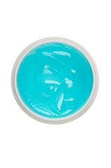 Top view of an uncapped Clubman Medium Hold Pomade showing its bright blue colored gel contents