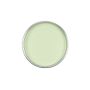 Top view of an uncovered can of GiGi Tea Tree Creme Wax showing melted light pastel green wax inside thumbnail
